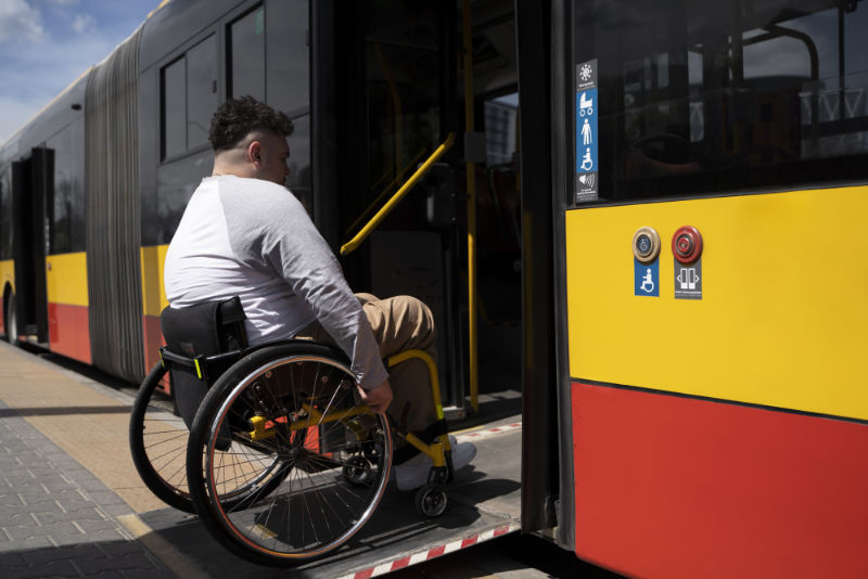 disabled-man-getting-bus-full-shot-sasupportive